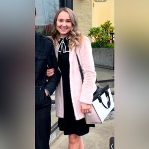 Black sweater dress with bow